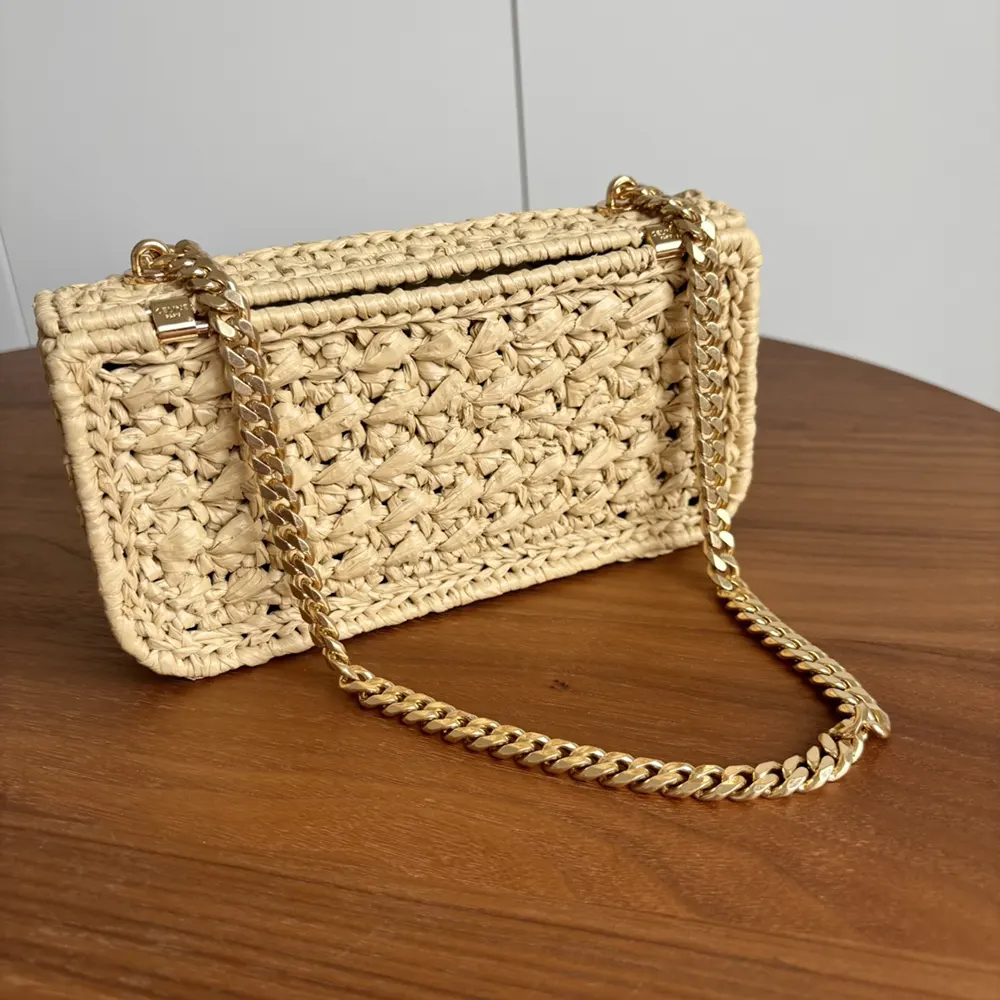Side angle showcasing silhouette of Celine Women Chain Shoulder Bag Claude