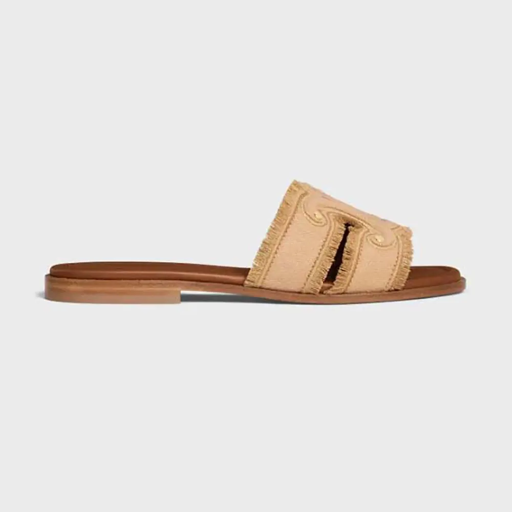 Side view of Celine Women Marina Fringed Mule in Cotton-Beige