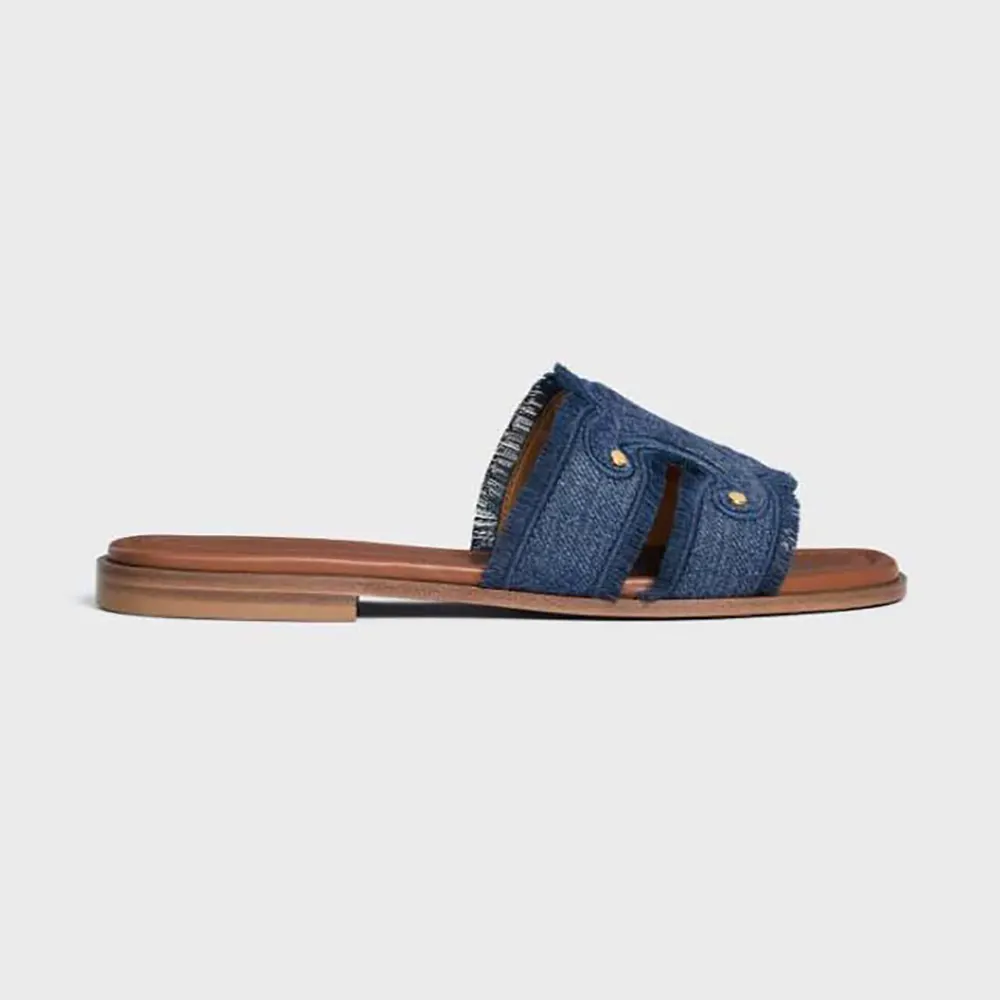 Side view of Celine Women Marina Fringed Mule in Denim-Navy