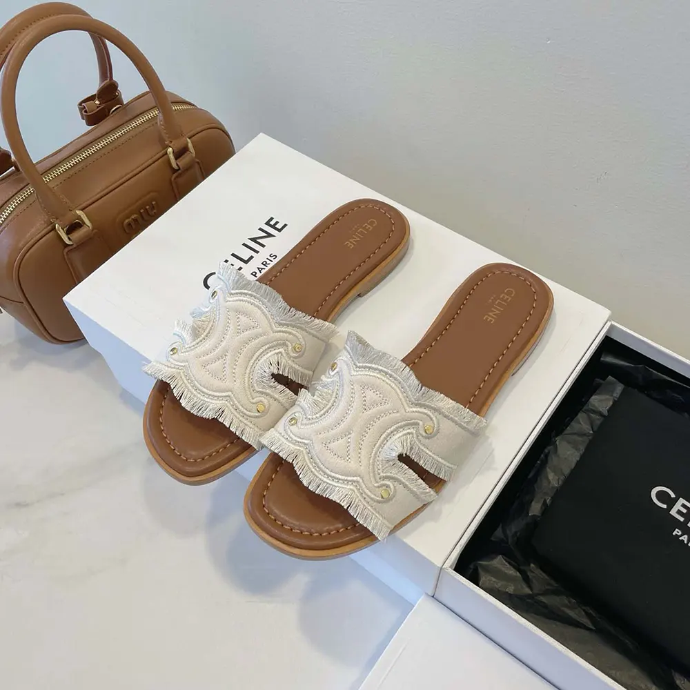 Top-down view of white Celine Women Marina Mule slip-on sandal