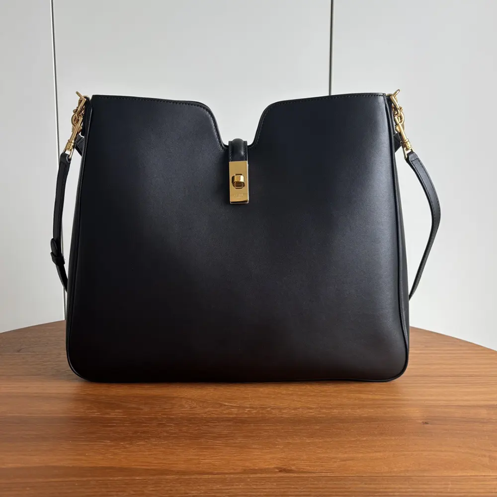 Close-up of gold clasp on Celine Women Medium Camille 16 Soft Bag