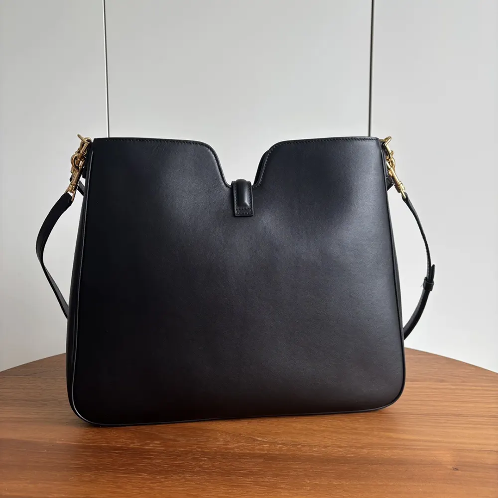 Side angle showing silhouette of Celine Women Medium Camille 16 Soft Bag