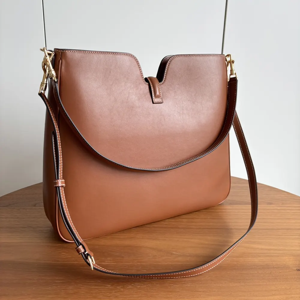 Side profile showing soft silhouette of Celine Women Medium Camille 16 bag