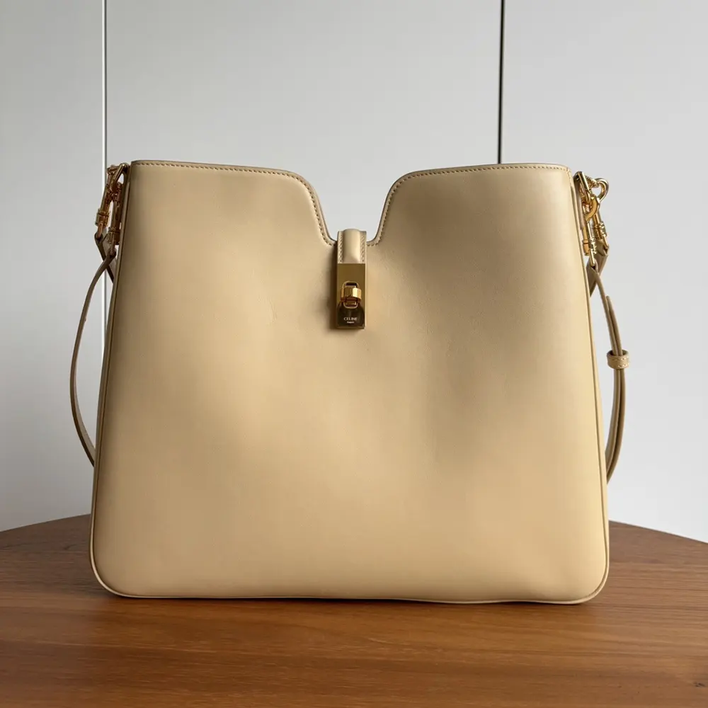 Close-up of gold hardware and smooth calfskin on Celine Camille bag