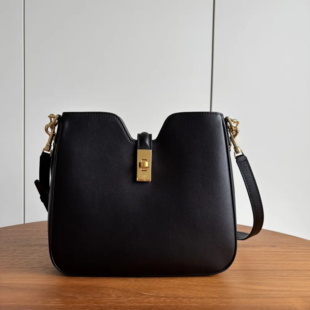 Close-up of gold-tone hardware on Celine Women Small Camille 16 Soft Bag