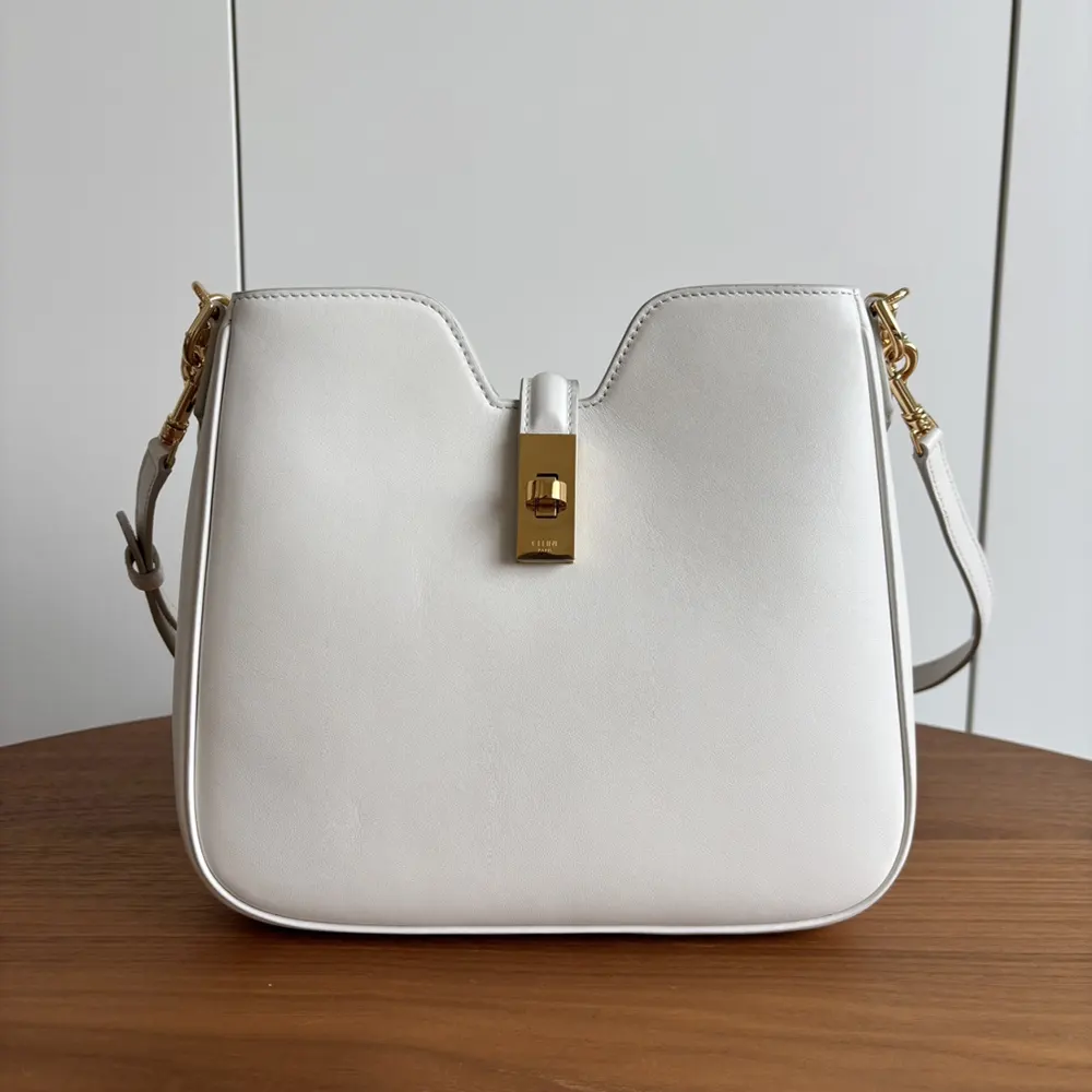 Close-up of gold-tone hardware on Celine Women Small Camille 16 Soft Bag