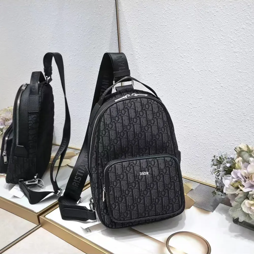 Close-up of silver hardware on Dior Men Mini Rider Backpack Black Dior Oblique Jacquard