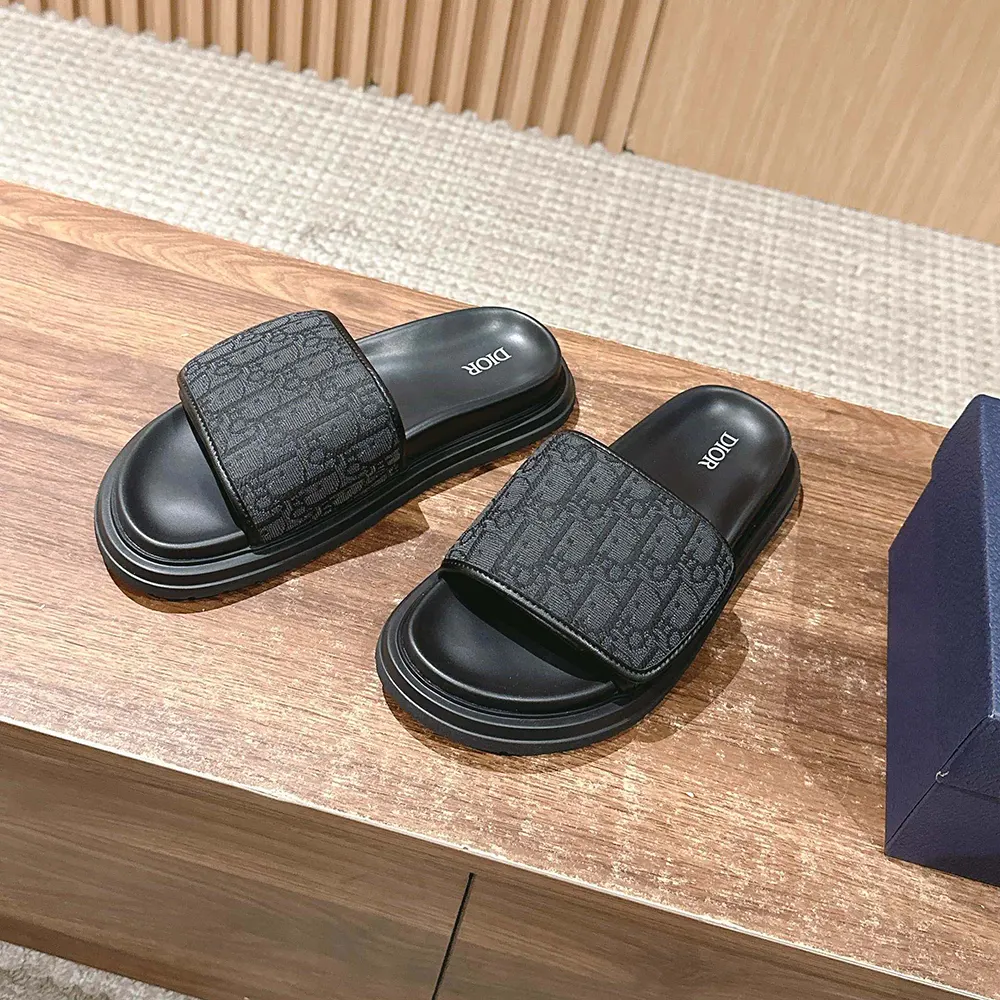Top view showing slip-on design of Dior Unisex Aqua Sandal Black Dior Oblique Jacquard