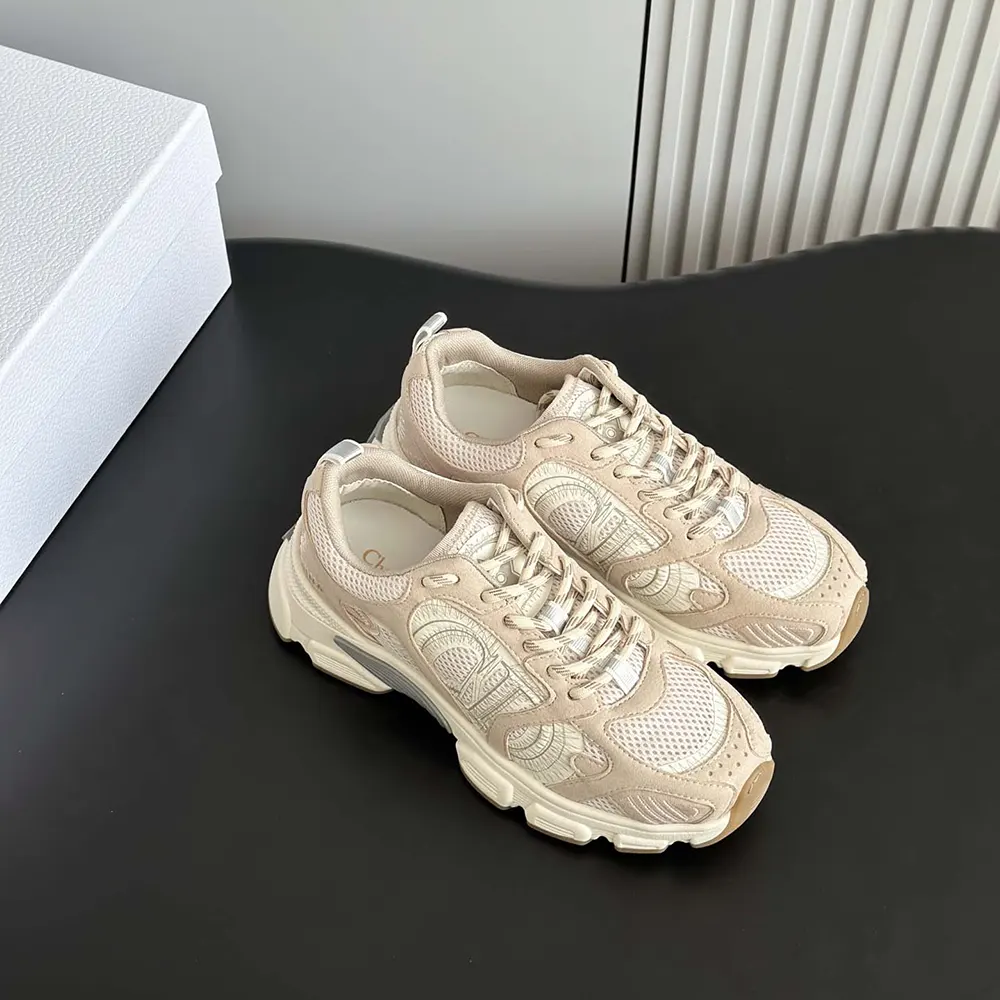 Top-down angle showing lace closure and texture on Dior Chrono Sneaker