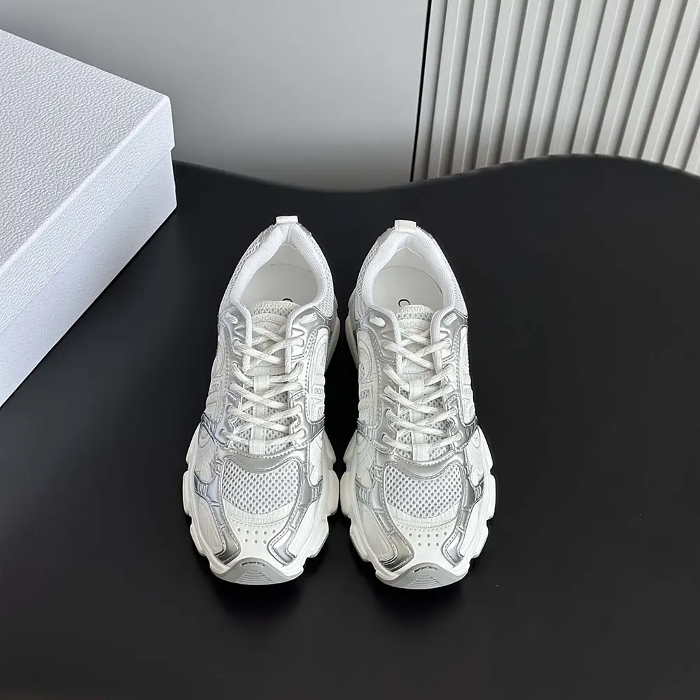 Close-up of silver-tone hardware on Dior Unisex Chrono Sneaker