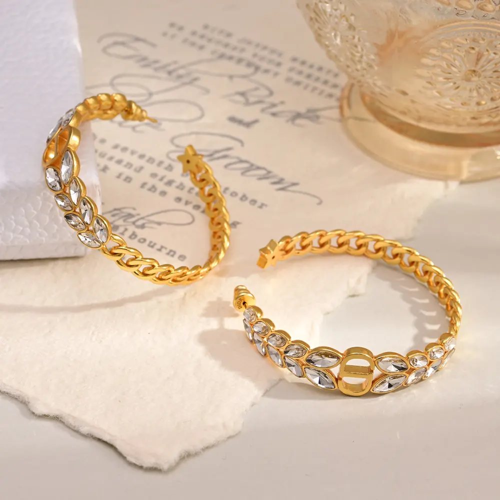 Side angle showing hinged closure on Dior Women 30 Montaigne Prestige Hoop Earrings