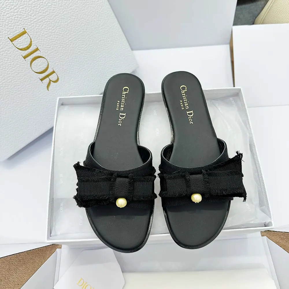 Side profile showing silhouette of Dior Women Adiorable Slide Black Grosgrain