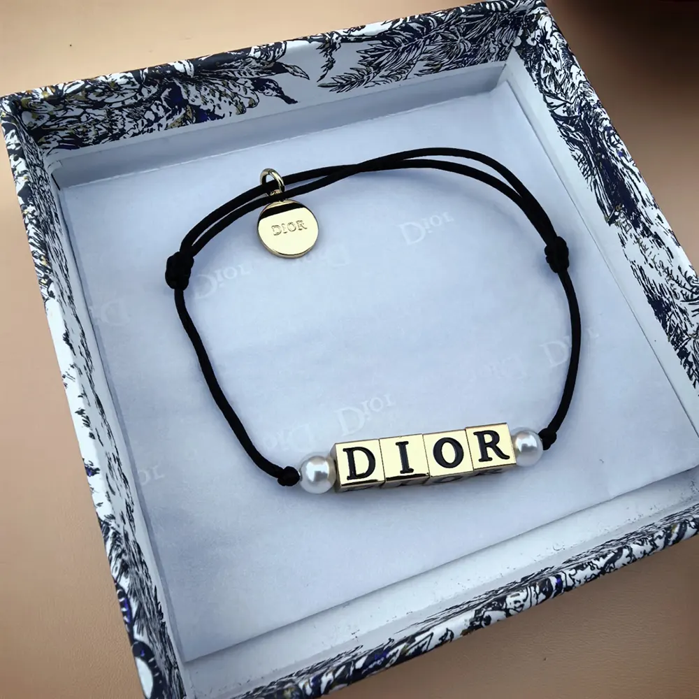Overhead image of Dior Women D-Dice Bracelet highlighting adjustable closure