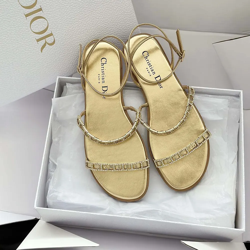 Close-up on silver-tone strass detail of Dior Women Diorissime Sandal Gold-Tone