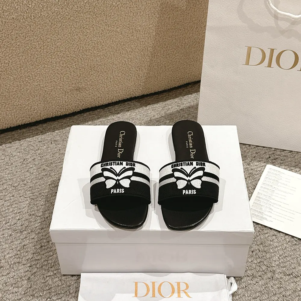Close-up of Papillon embroidery on Dior Women Dway Slide sandal