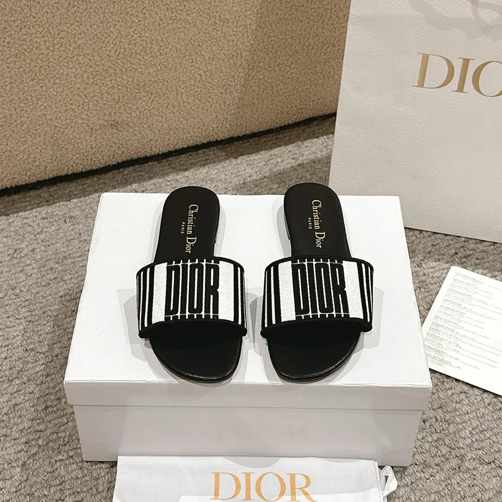 Close-up of Dior Graphique embroidered motif on Dior Women Dway Slide sandal