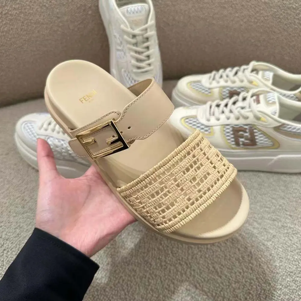 Close-up of raffia FF embroidery detail on Fendi slides