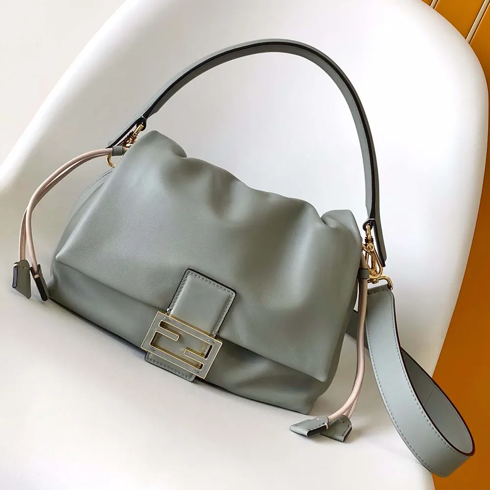 Close-up of gold hardware on Fendi Women Mamma Baguette Medium Matcha Green bag