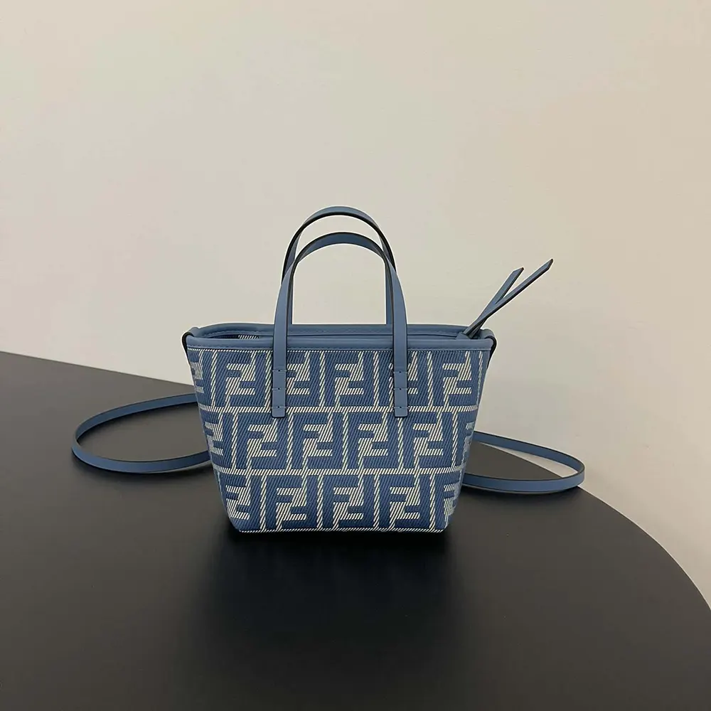 Close-up of silver-tone FF hardware on Fendi Blue Denim-effect mini-bag