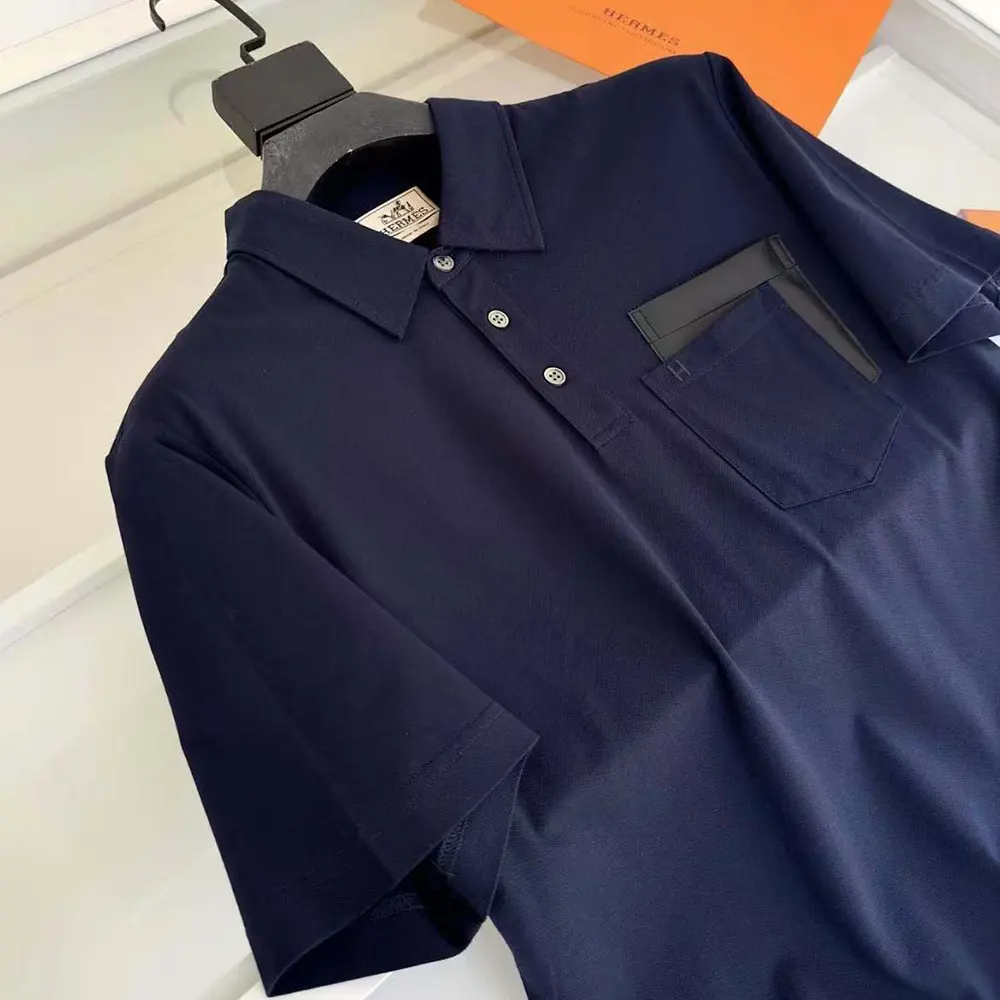 Side angle showing slim fit silhouette of Hermes Men Polo Shirt