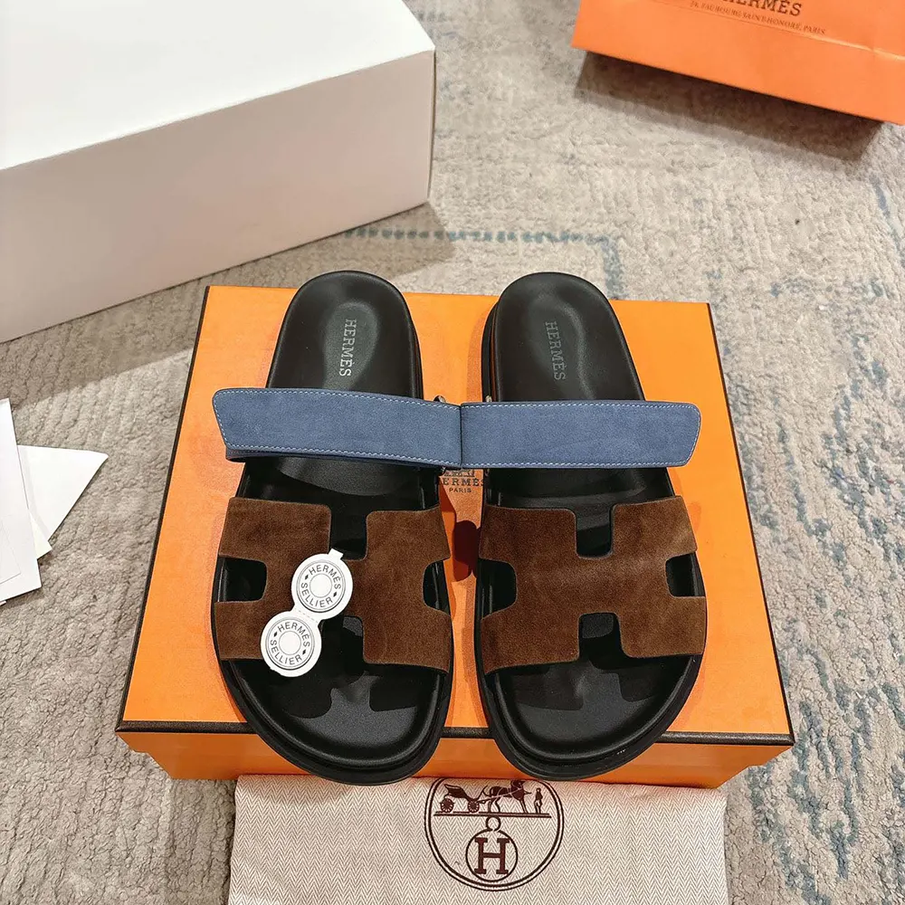 Side profile of Hermes Unisex Chypre Sandal-Blue/Brown highlighting leather texture