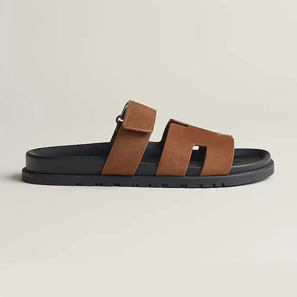 Side view of Hermes Unisex Chypre Sandal-Brown showing cut-out design
