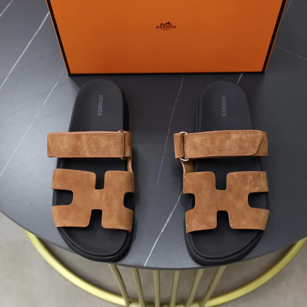 Top-down angle of Hermes Unisex Chypre Sandal-Brown slip-on silhouette
