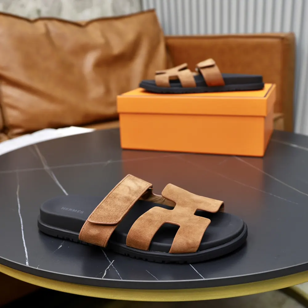 Close-up on Hermes Unisex Chypre Sandal-Brown leather texture and stitching