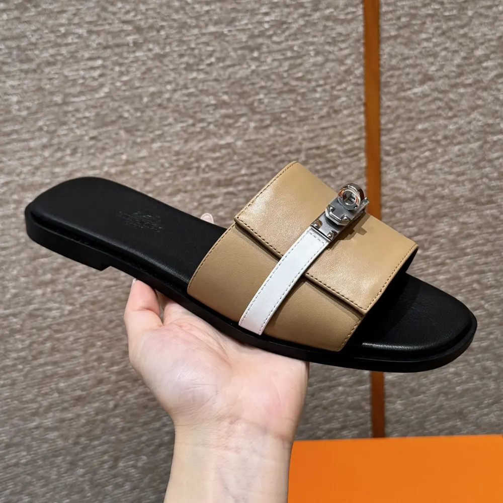 Top view of Hermes Unisex Giulia sandal-Sandy/White highlighting adjustable strap