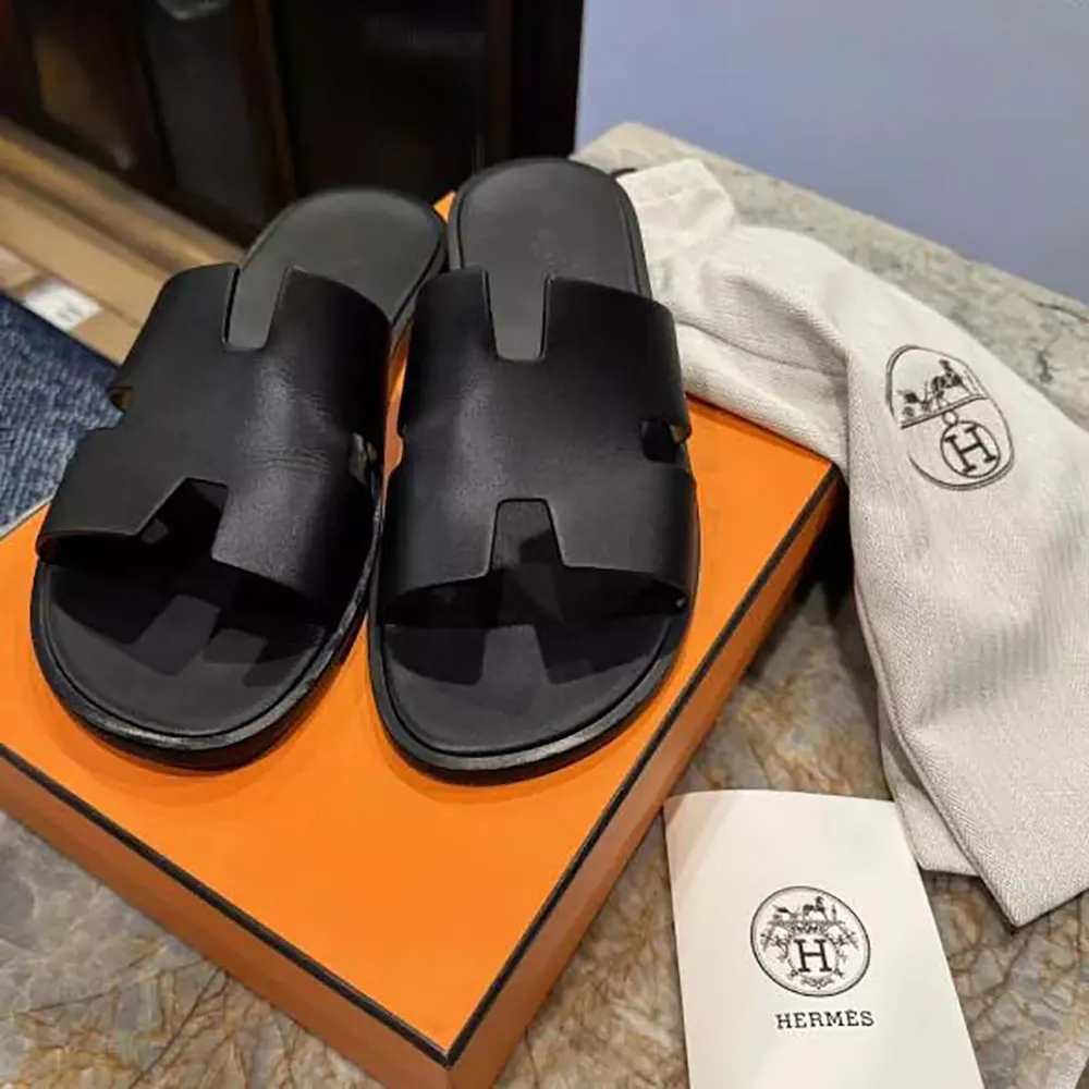 Top view of Hermes Unisex Izmir Sandal-Black highlighting leather cutouts
