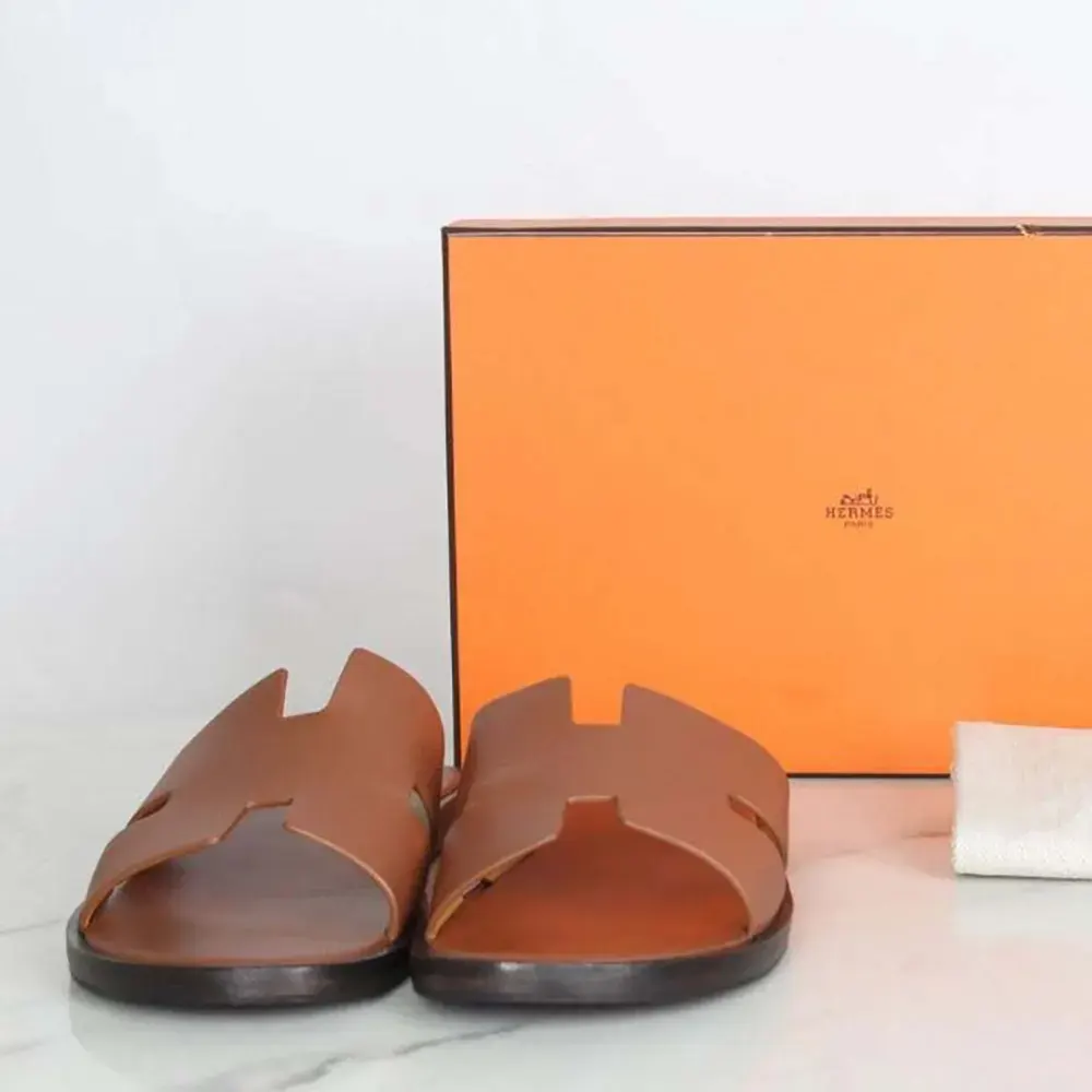 Top close-up of Hermes Unisex Izmir Sandal-Brown adjustable closure