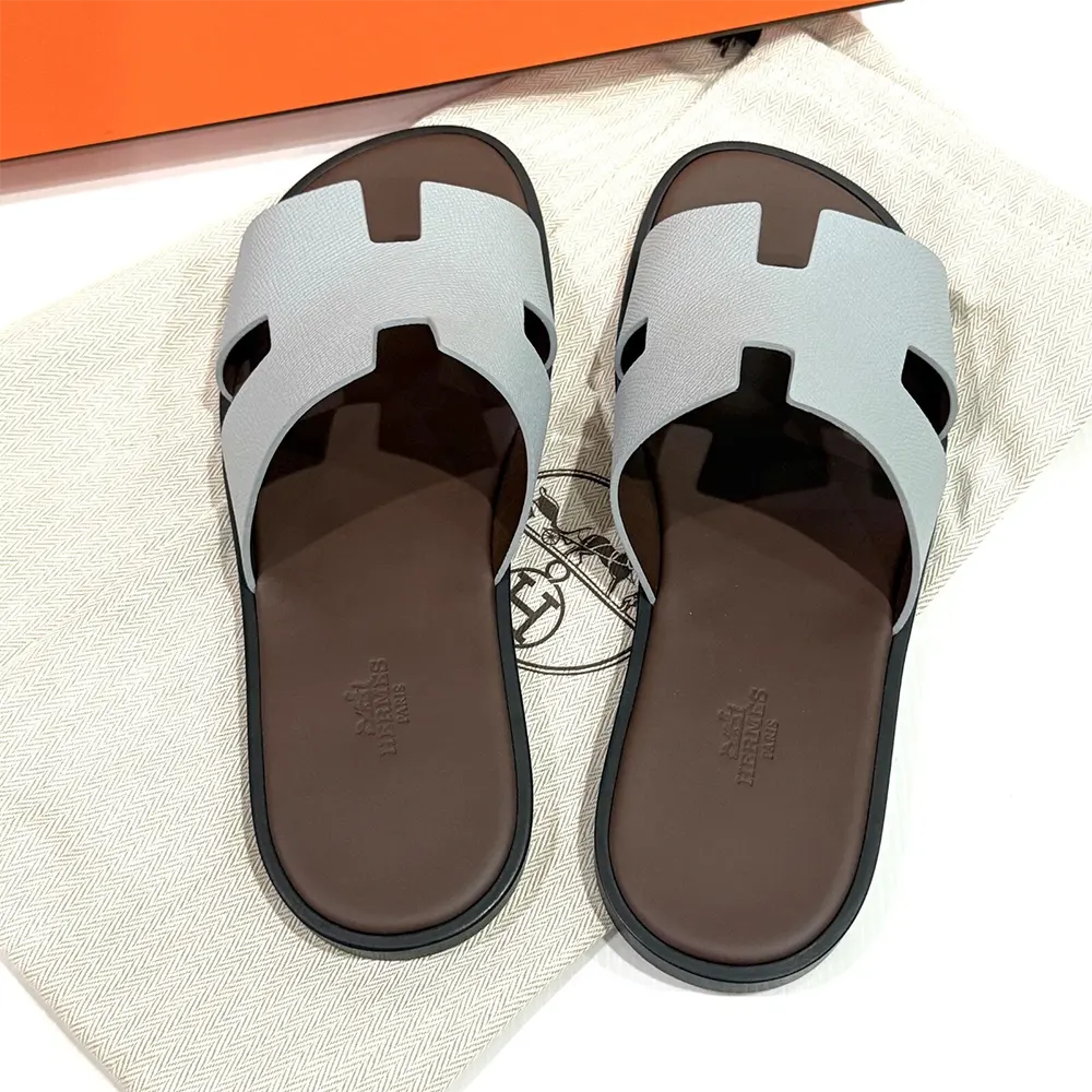 Top-down view of Hermes Unisex Izmir Sandal-Light Blue open-toe silhouette