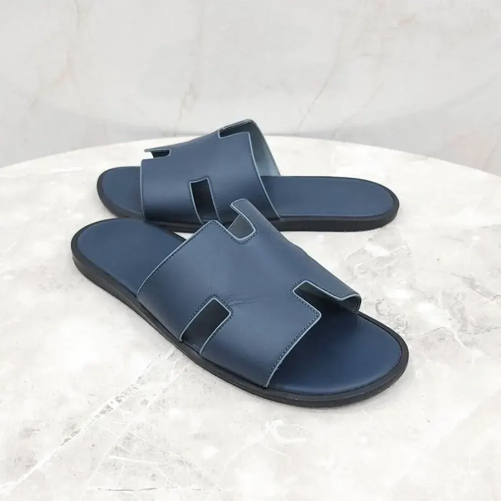 Close-up detail of navy leather and buckle on Hermes Unisex Izmir Sandal-Navy