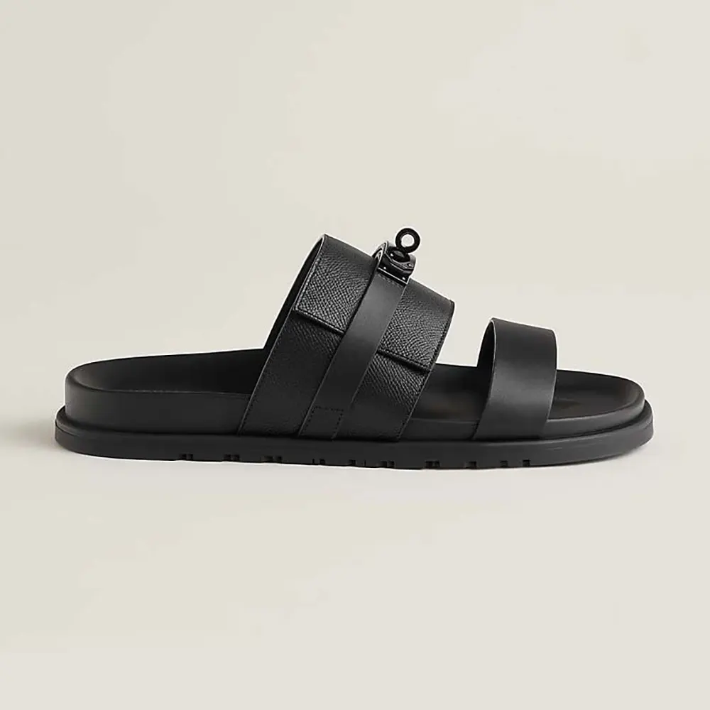 Side profile of Hermes Unisex Jackson Sandal-Black showing silhouette