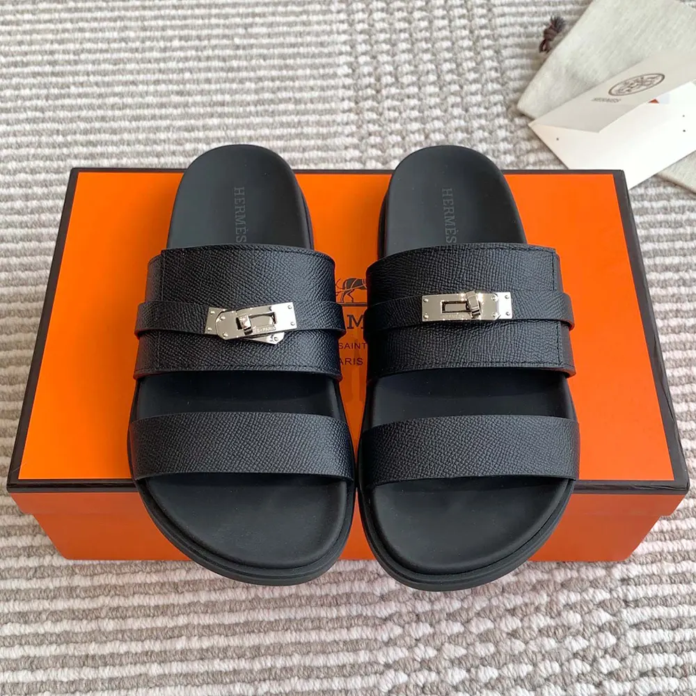 Top view of Hermes Unisex Jackson Sandal-Black displaying H cut-out detail