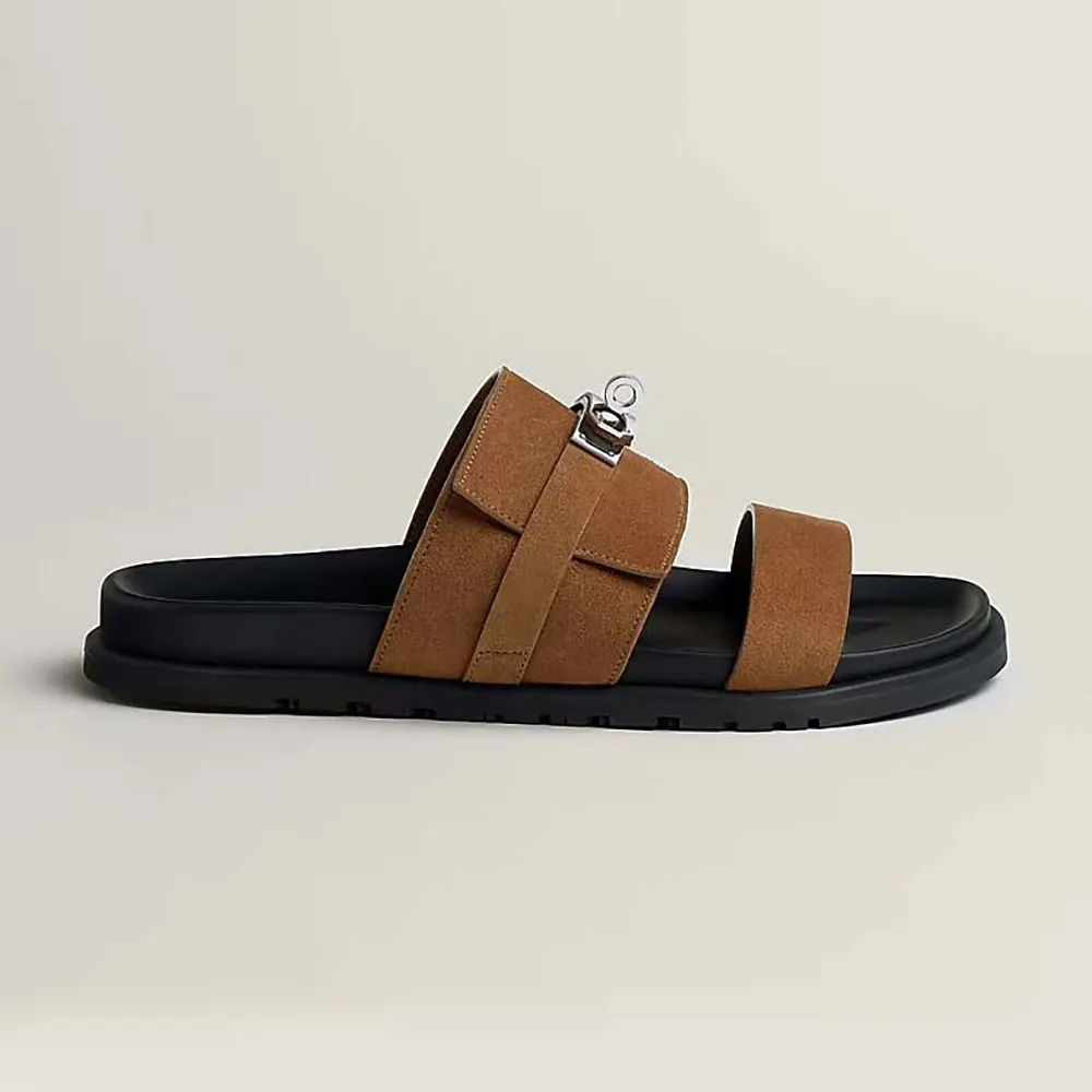 Side profile of Hermes Unisex Jackson Sandal-Brown showing leather texture