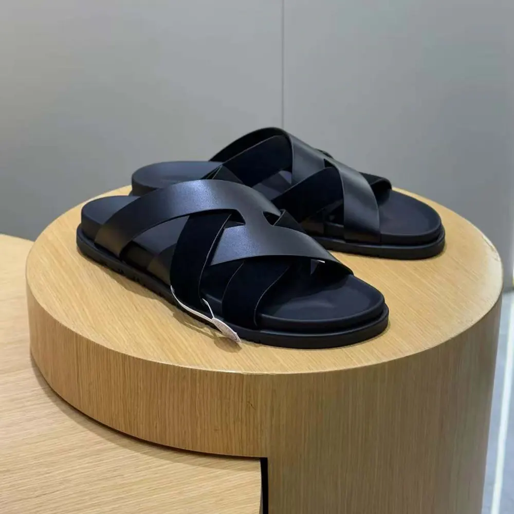 Close-up of polished silver hardware on Hermes Unisex Kazimir Sandal-Black
