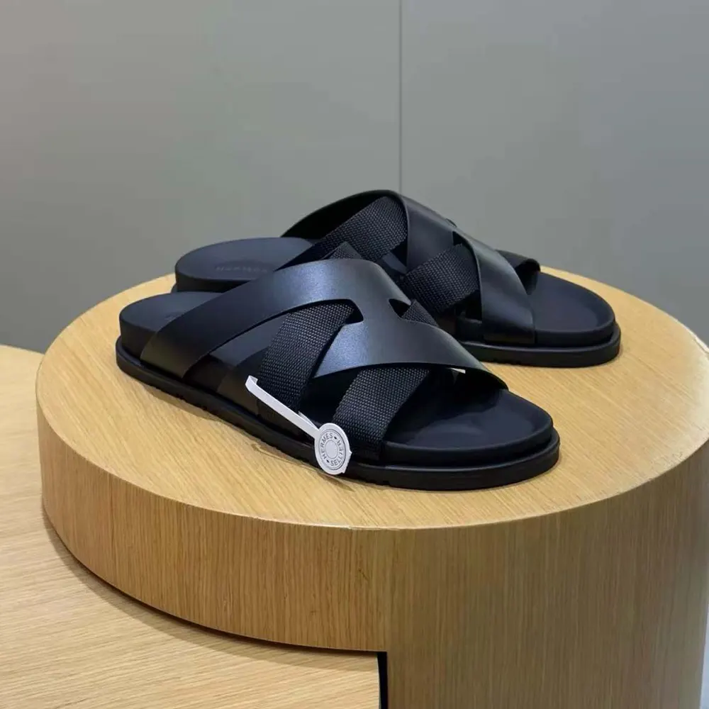 Overhead view of Hermes Unisex Kazimir Sandal-Black highlighting cutout design