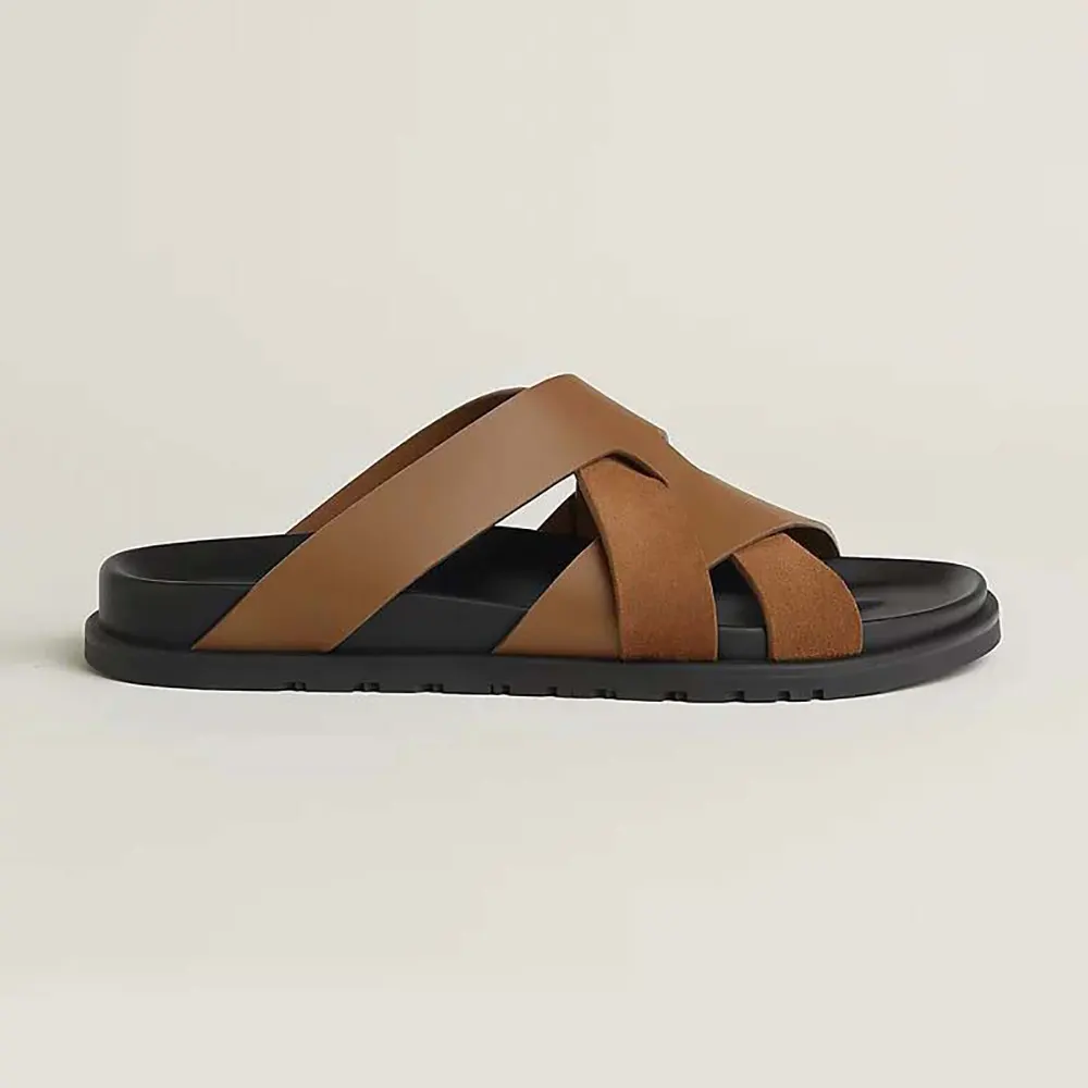 Side profile of Hermes Unisex Kazimir Sandal-Brown showing buckle detail