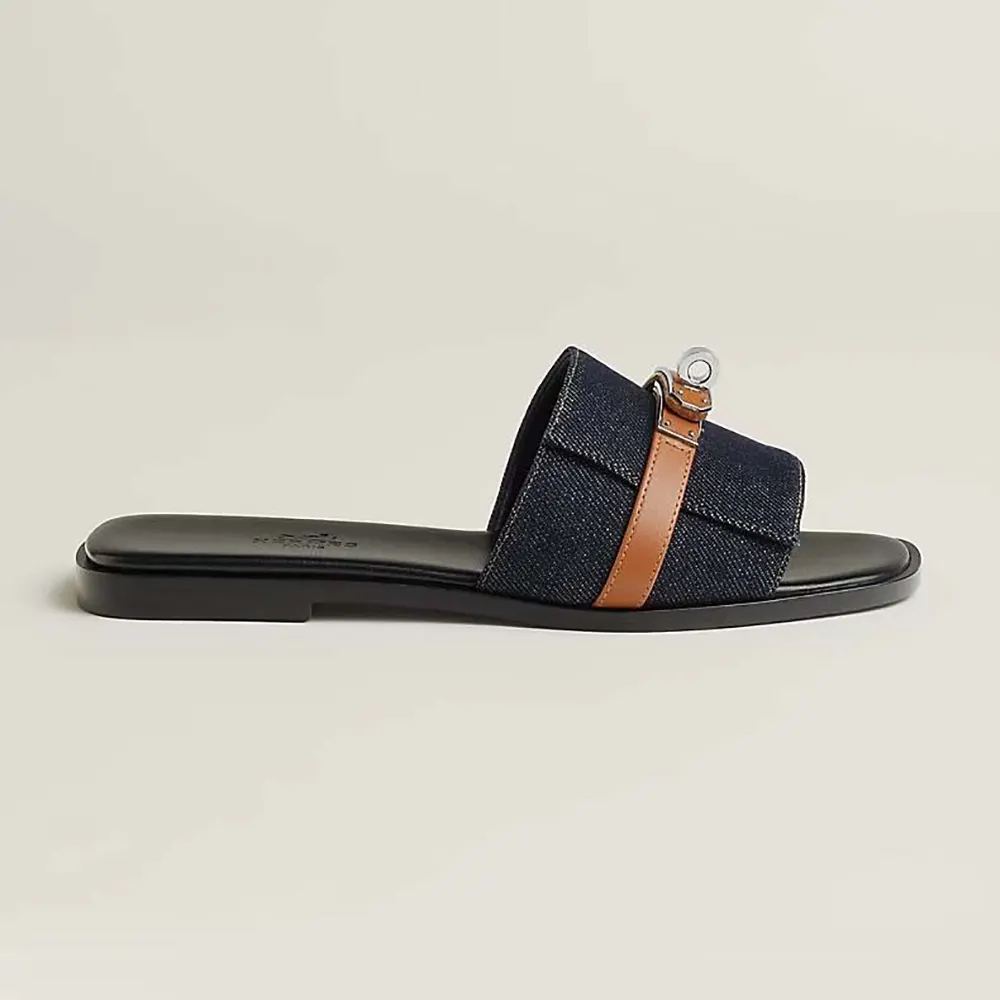Side view of Hermes Women Giulia Sandal-Navy showing H-cut design