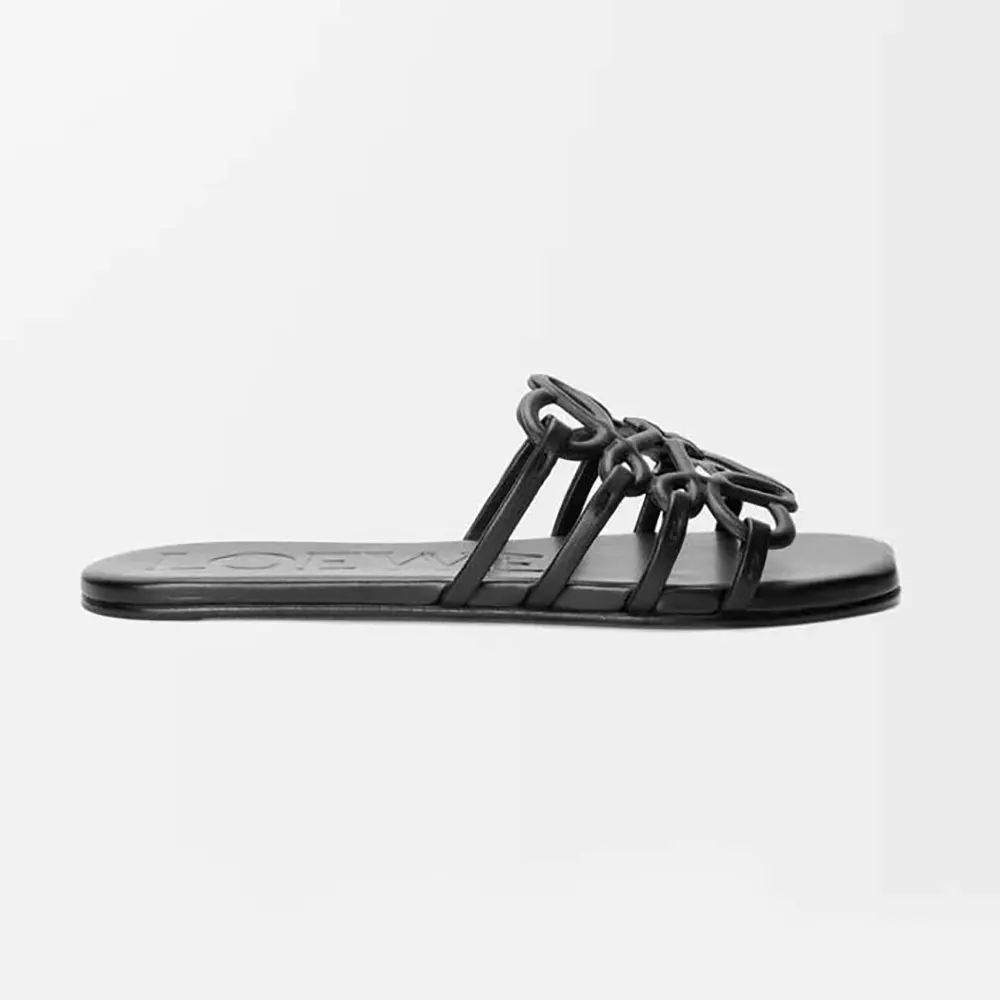 Side view of Loewe Women Petal Anagram Slide in Soft Calfskin-Black