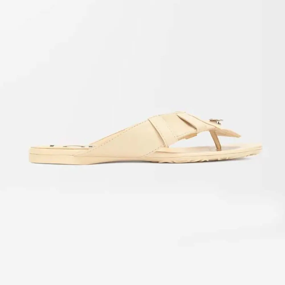 Side view of Loewe Women Toy Panta Toe Post Sandal in Lambskin-Beige