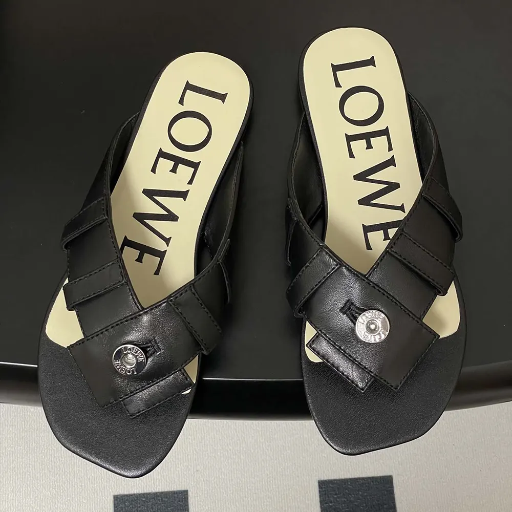 Top view showing black toe post silhouette of Loewe Women Toy Panta Sandal