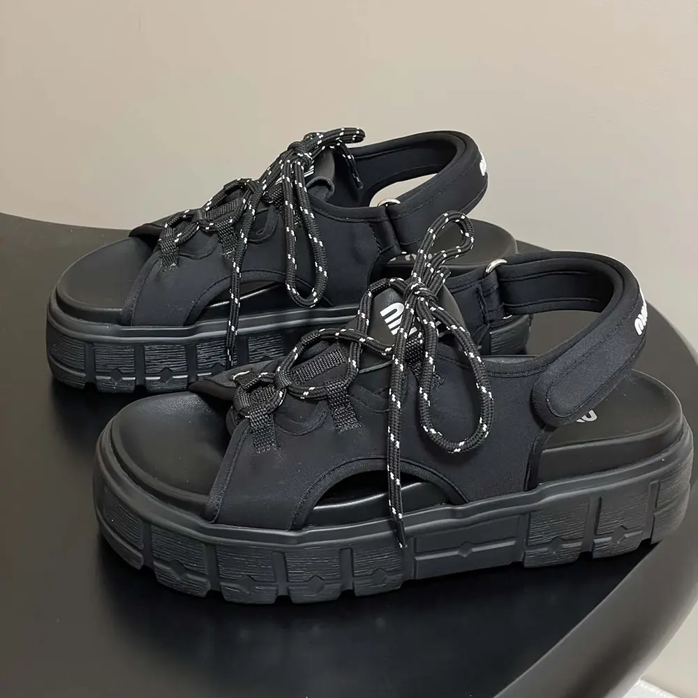 Top view showing chunky sole and neoprene material of Miu Miu sandals