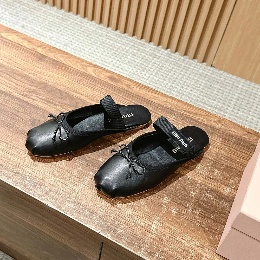 Top angle of Miu Miu Women Leather Ballerina Mules-Black highlighting slip-on design