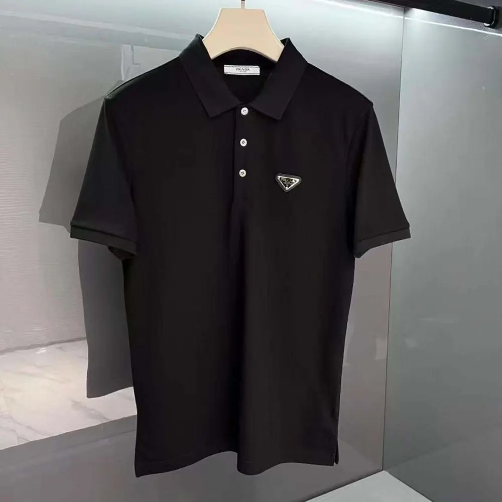 Close-up of fleece texture and Prada logo embroidery on shirt