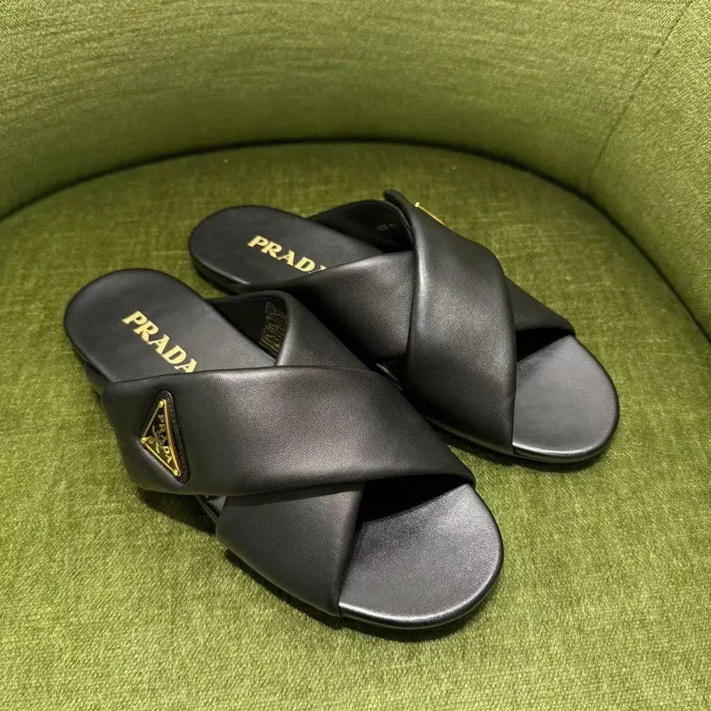 Close-up of soft black nappa leather on Prada Women Nappa Leather Slides-Black