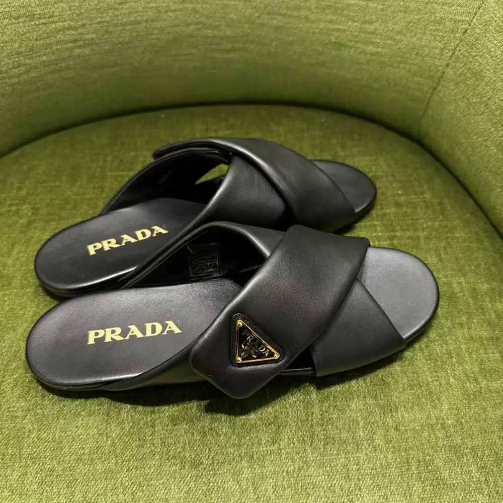 Top view displaying open-toe and slip-on style of Prada Women Nappa Leather Slides-Black