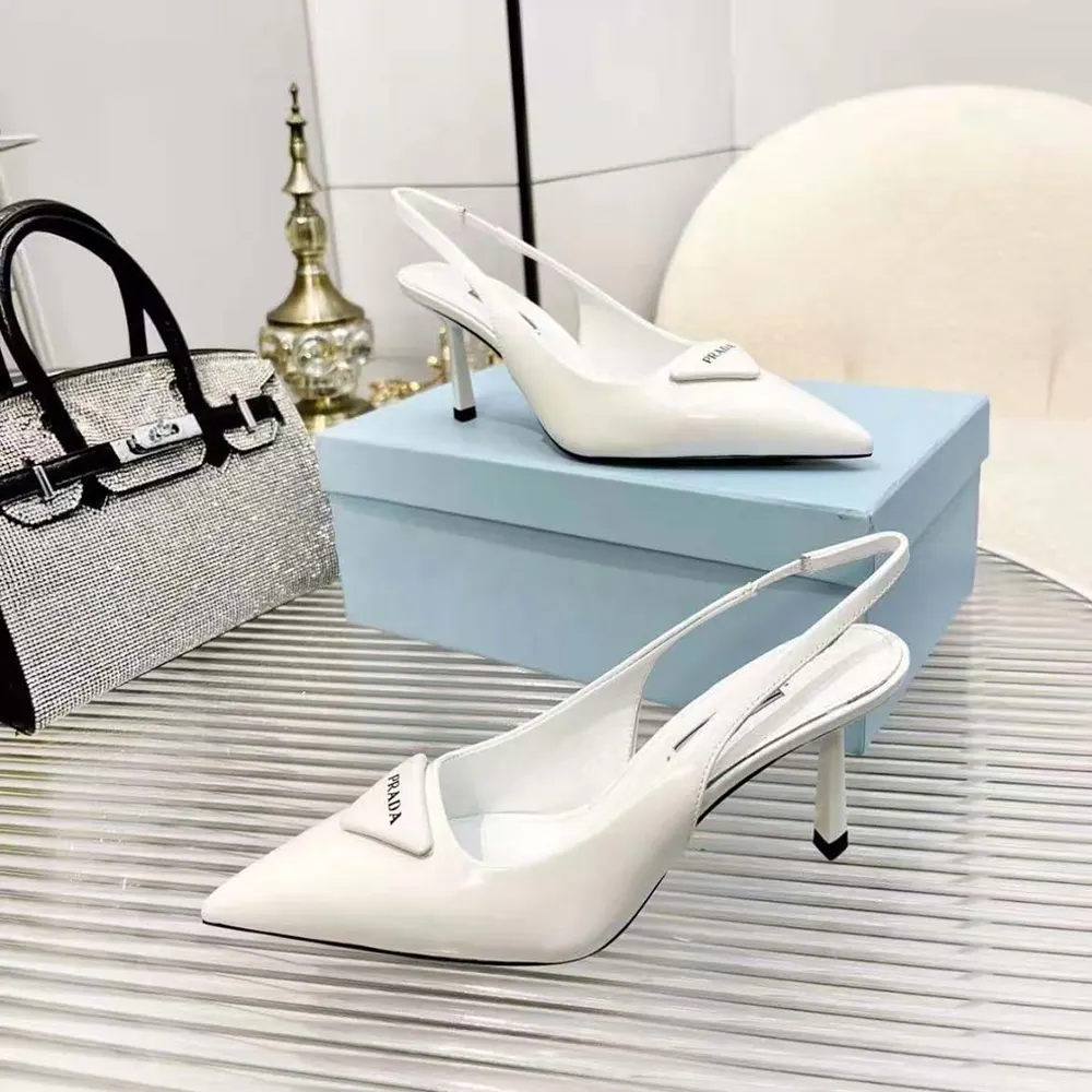 Back angle showing adjustable strap on Prada Women Saffiano Patent Leather Pumps