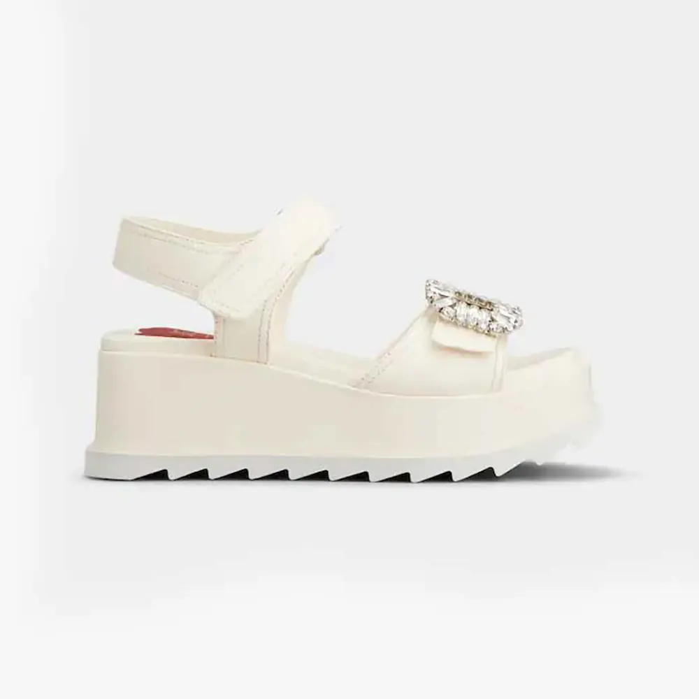 Side view of Roger Vivier Women Slidy Viv’ Wedge Sandals in Leather-White